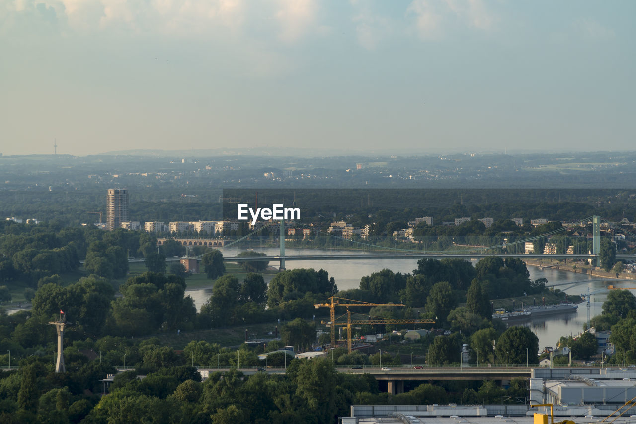 High angle view of buildings in city against sky