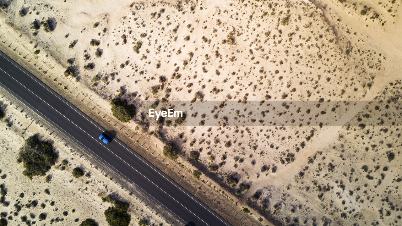 Aerial view of road on desert