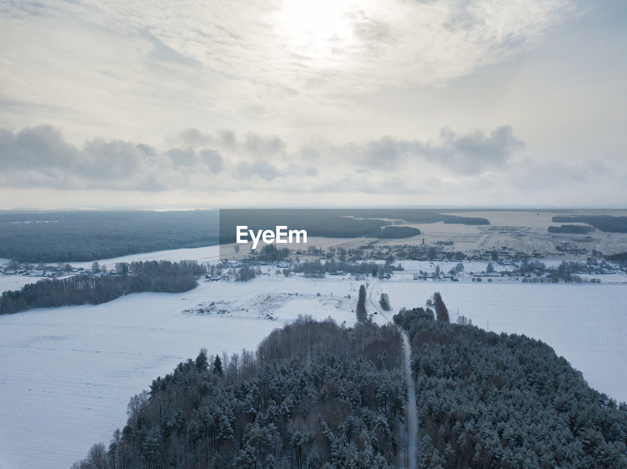 SCENIC VIEW OF SEA DURING WINTER AGAINST SKY