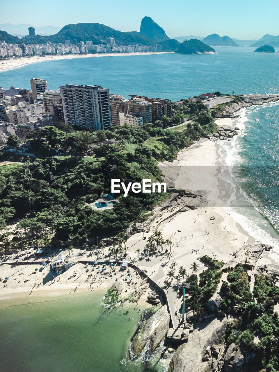 water, sea, coast, land, beach, bay, nature, shore, ocean, travel destinations, architecture, sky, city, scenics - nature, travel, aerial photography, coastline, landscape, building exterior, built structure, vacation, beauty in nature, environment, building, tourism, no people, mountain, body of water, outdoors, day, high angle view, holiday, trip, tree, terrain, sports, blue, bay of water, cityscape, cliff, urban skyline, aerial view, sand, sunny, plant, cove, island, sunlight, tranquility, clear sky, summer
