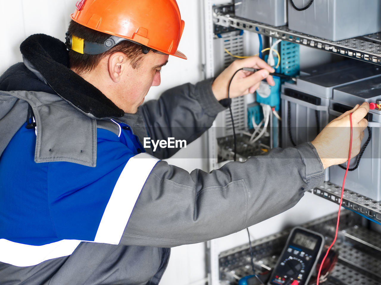 midsection of man working in factory