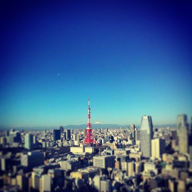 VIEW OF CITYSCAPE AGAINST BLUE SKY