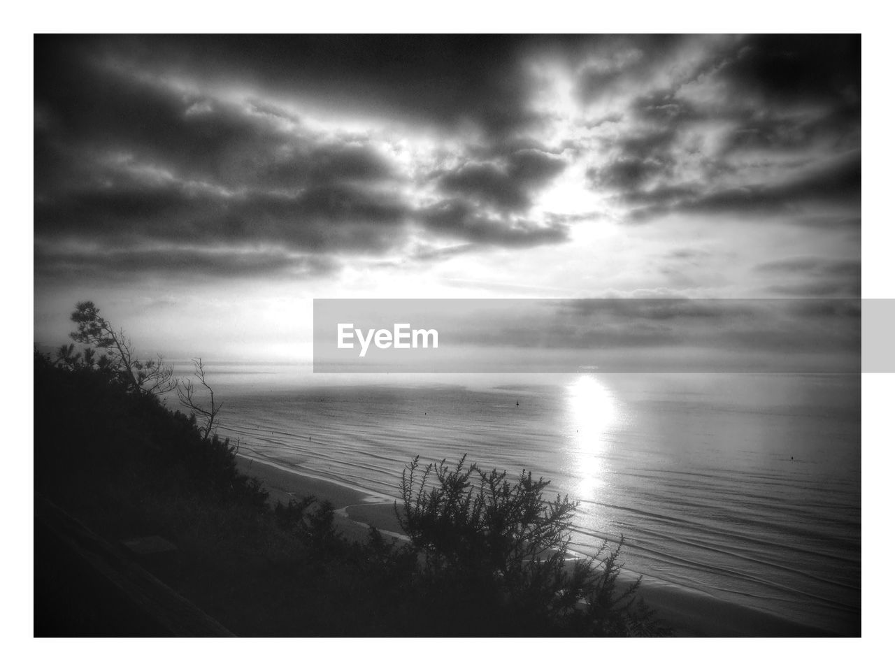 Scenic view of beach and sea against sky during sunset