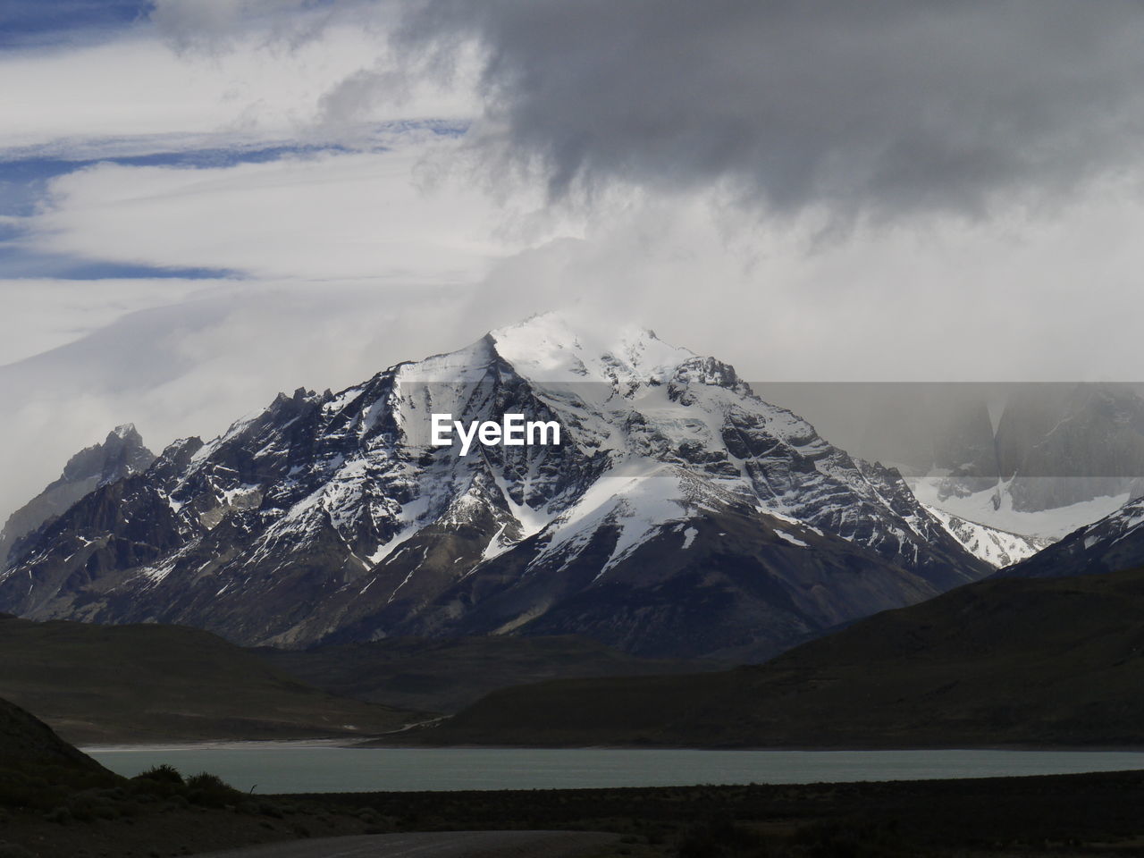 Scenic view of snowcapped mountains against sky, torres del paine mountains, patagonia, chile 