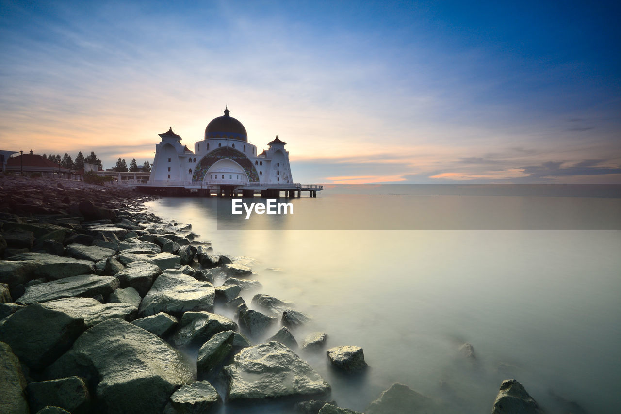 SCENIC VIEW OF SEA DURING SUNSET