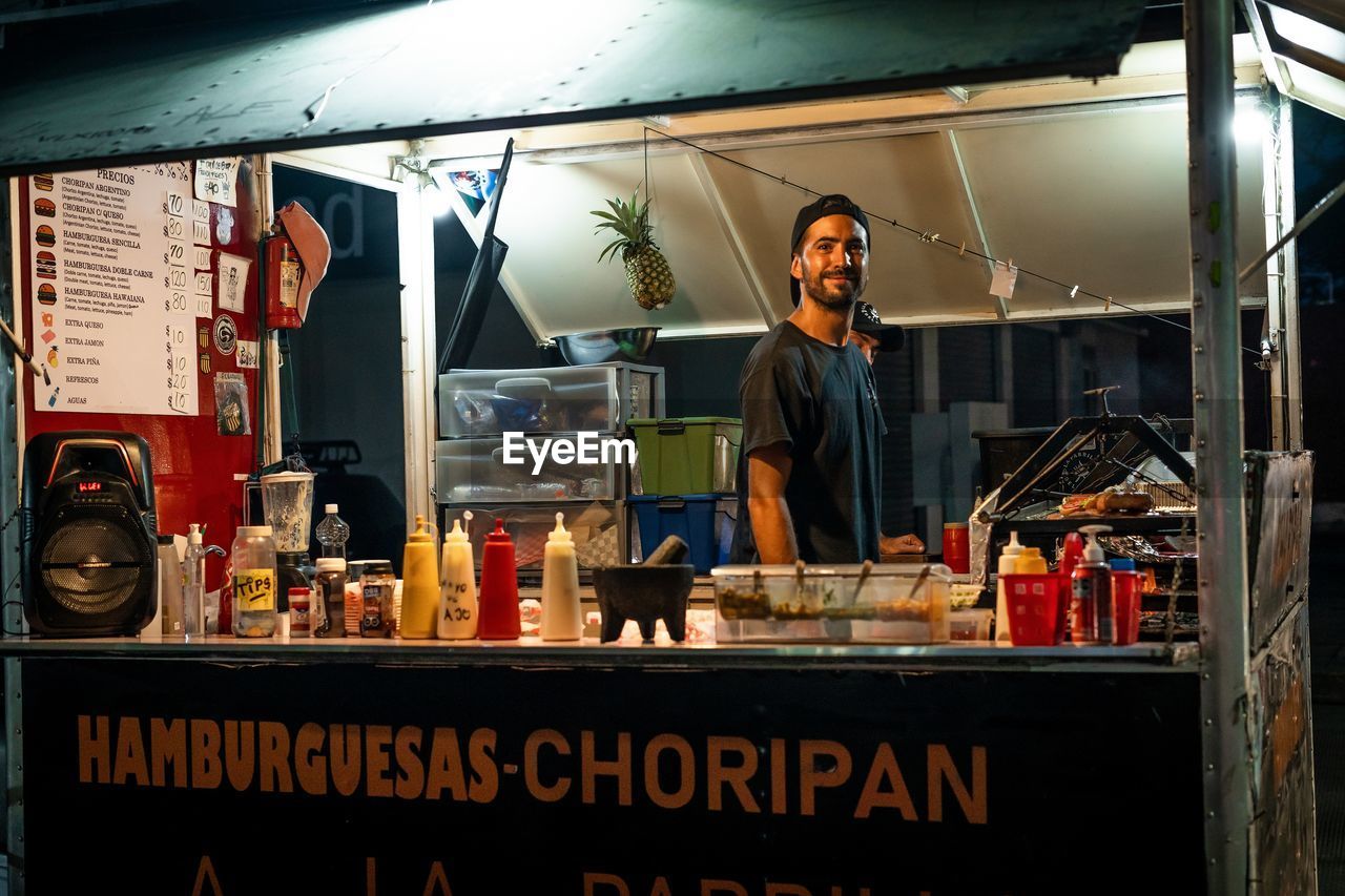 Portrait street market food owner