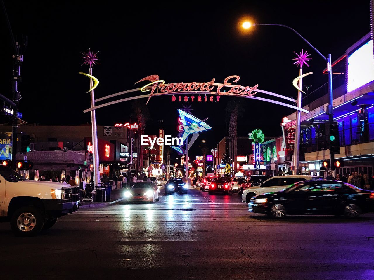 ILLUMINATED CITY STREET AT NIGHT