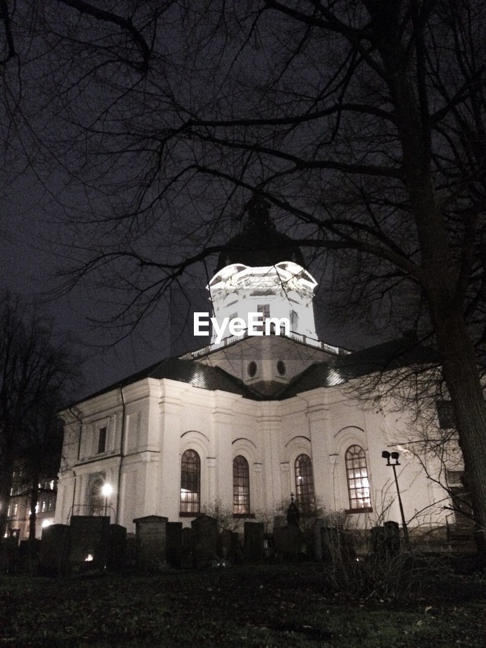 Exterior of illuminated adolf fredrik church against sky at night
