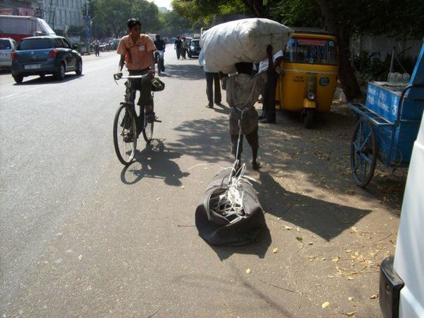 PERSON RIDING BICYCLE ON STREET
