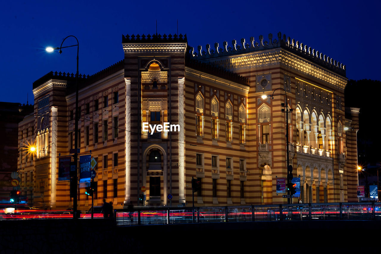 ILLUMINATED BUILDING AT NIGHT