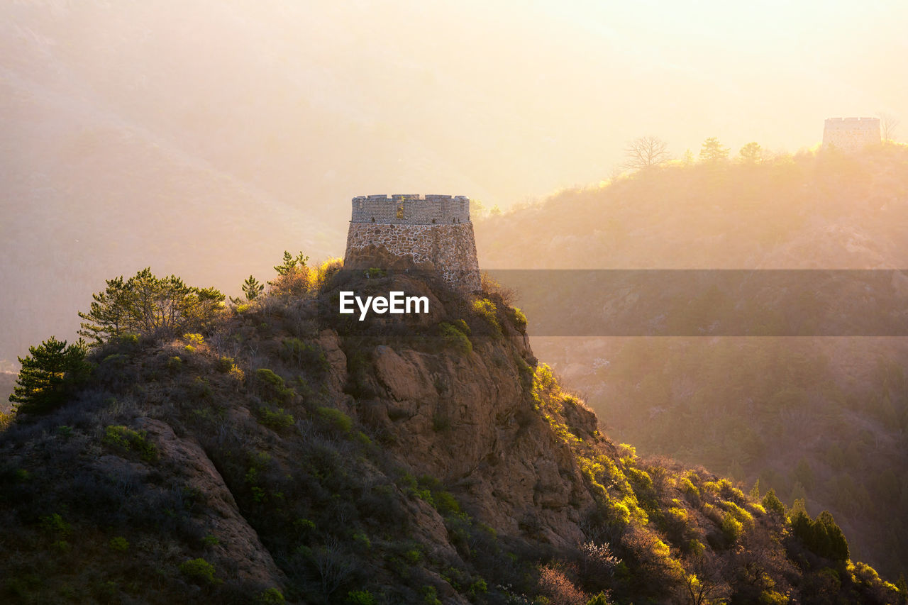 VIEW OF FORT AGAINST MOUNTAIN