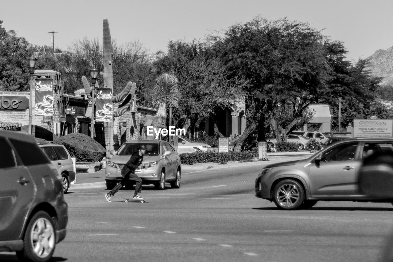 CARS PARKED ON ROADSIDE