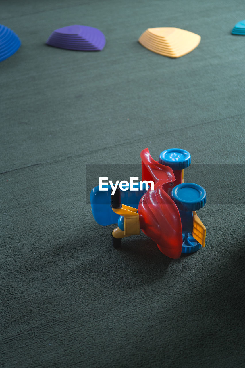 High angle view of toys on carpet at home