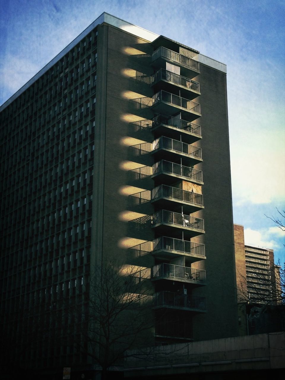 LOW ANGLE VIEW OF MODERN BUILDINGS