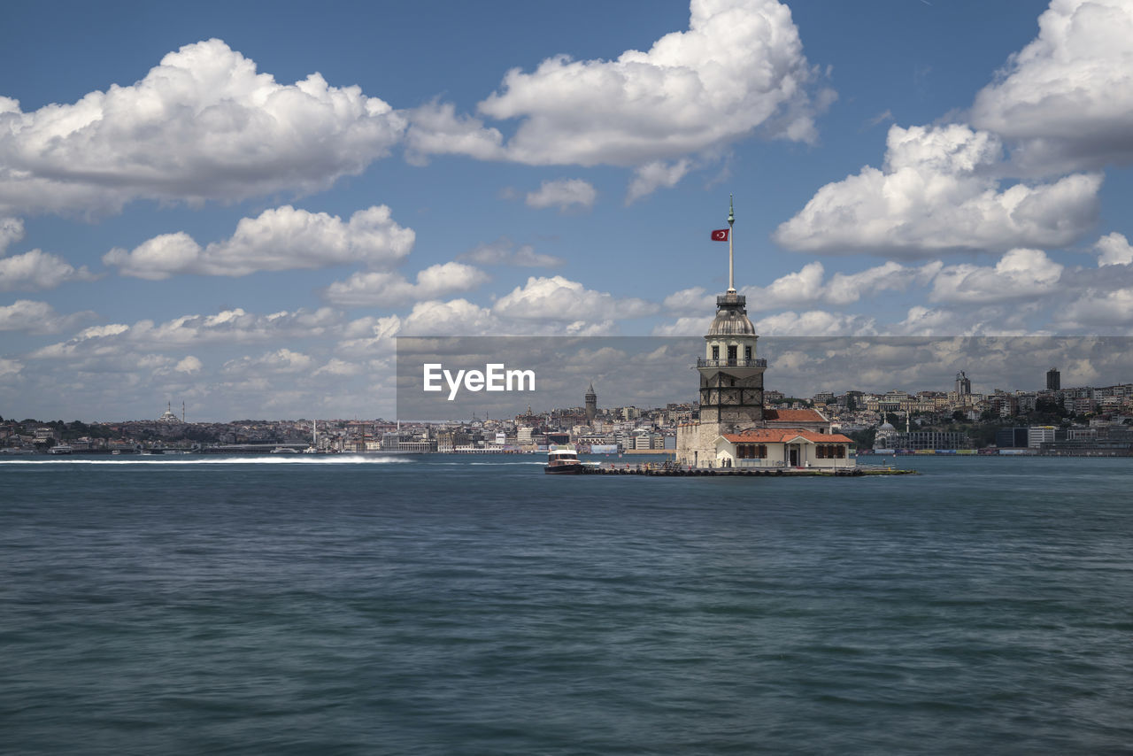 View of sea with buildings in background