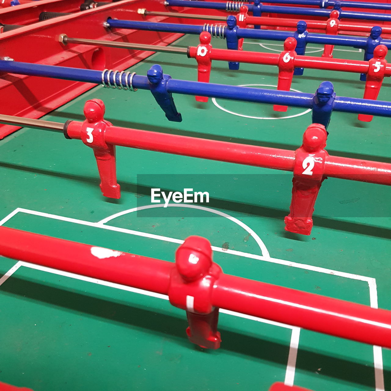 HIGH ANGLE VIEW OF SOCCER BALL ON TABLE AT HOME