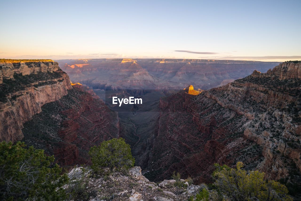 Scenic view of mountains at grand canyon national park during sunrise