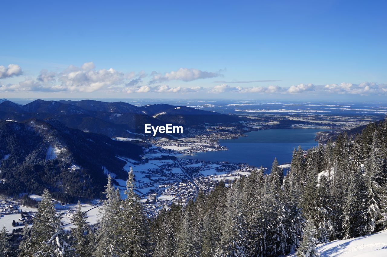 Aerial view of snowcapped mountains against sky