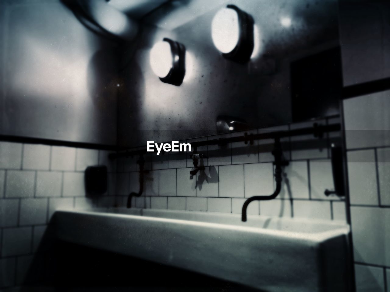 Faucet and sink with illuminated lights