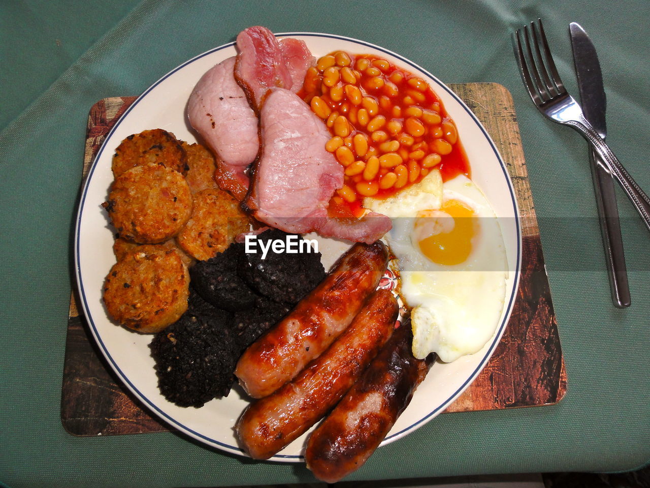 Directly above shot of english breakfast served on table