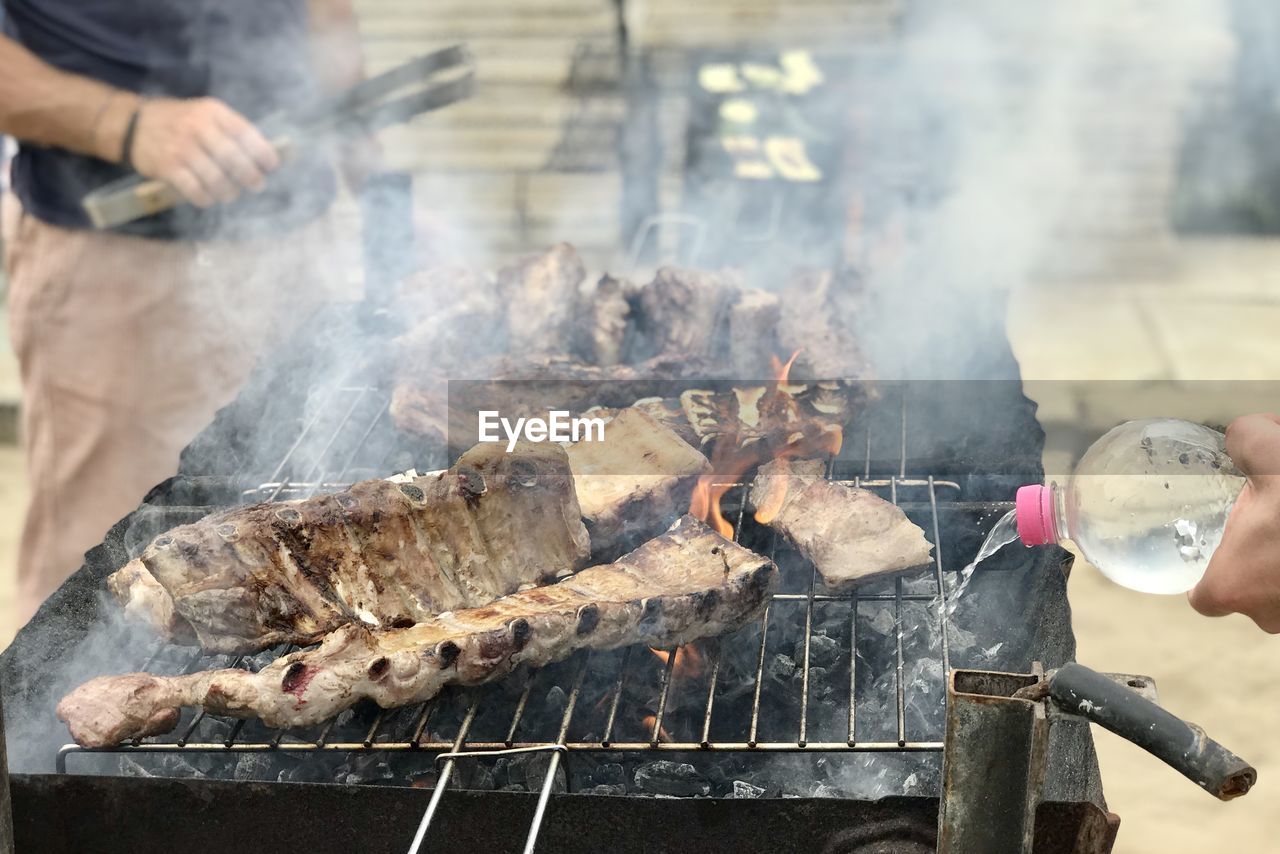 Close-up of meat on barbecue grill