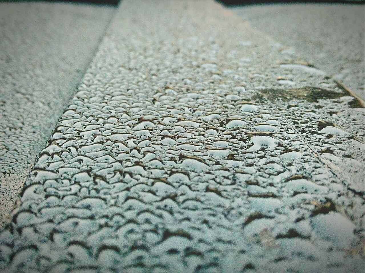 Water drops on footpath during rainy season