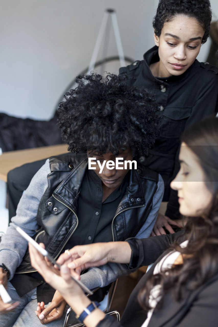 Young professional women working in an office space