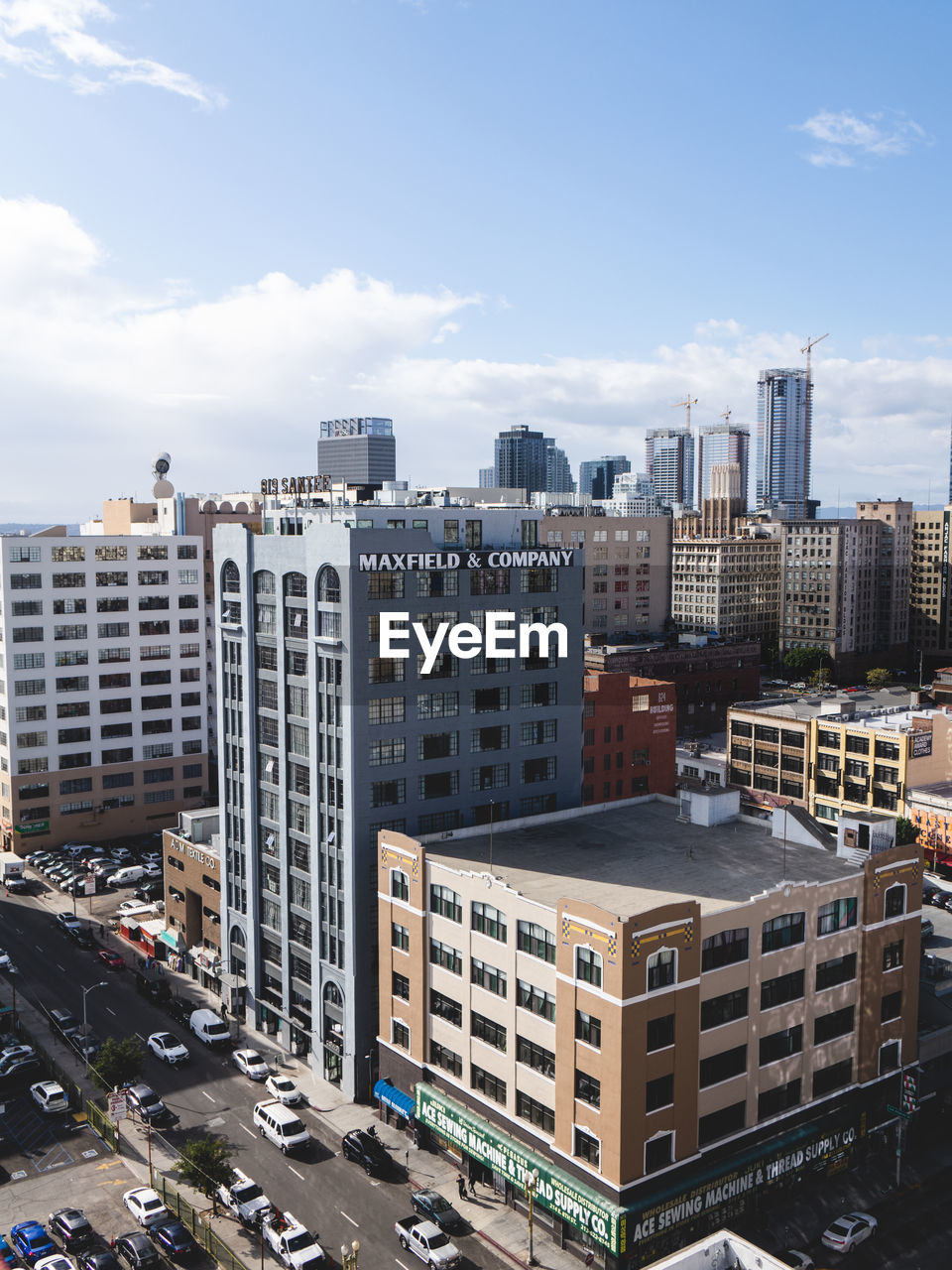 HIGH ANGLE VIEW OF CITY BUILDINGS AGAINST SKY