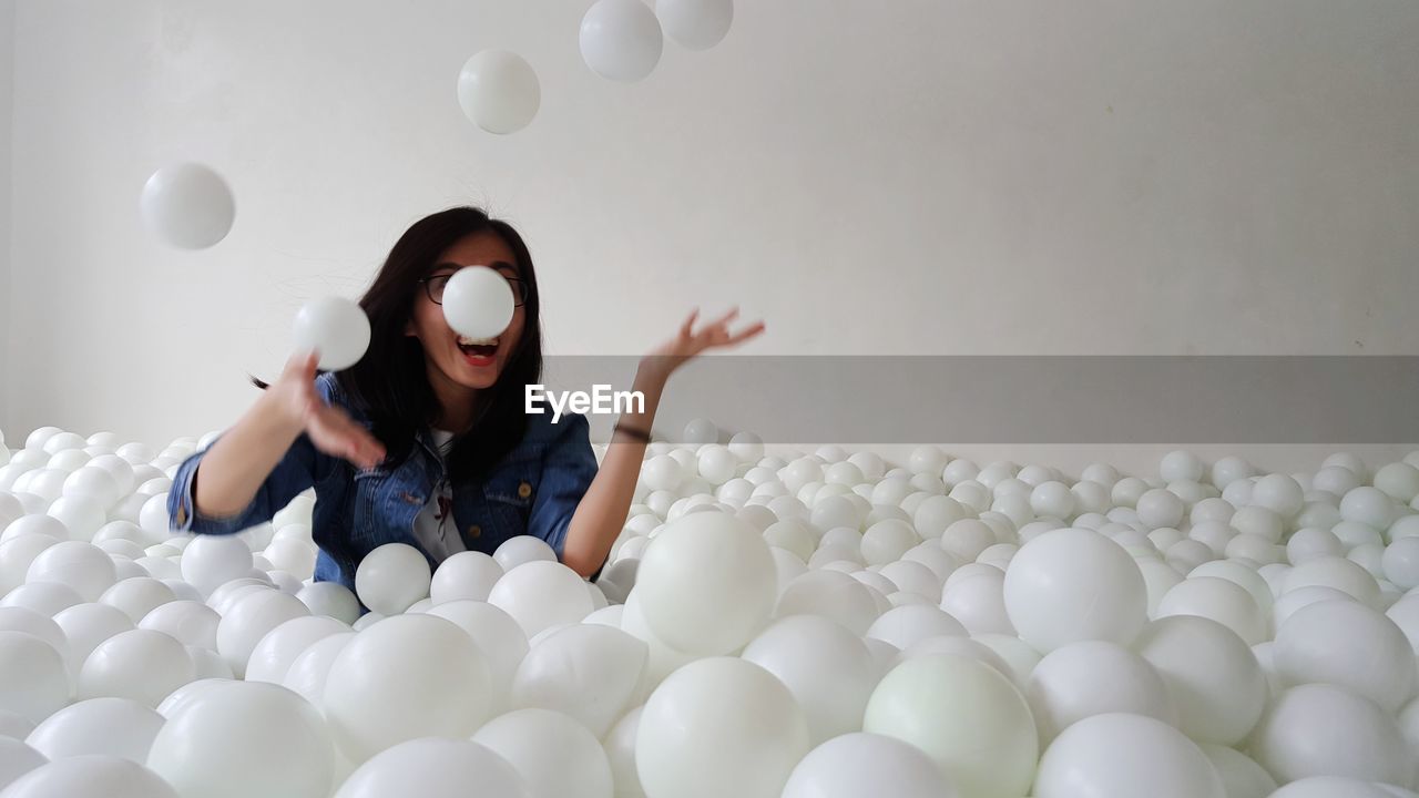 Woman enjoying in ball pool