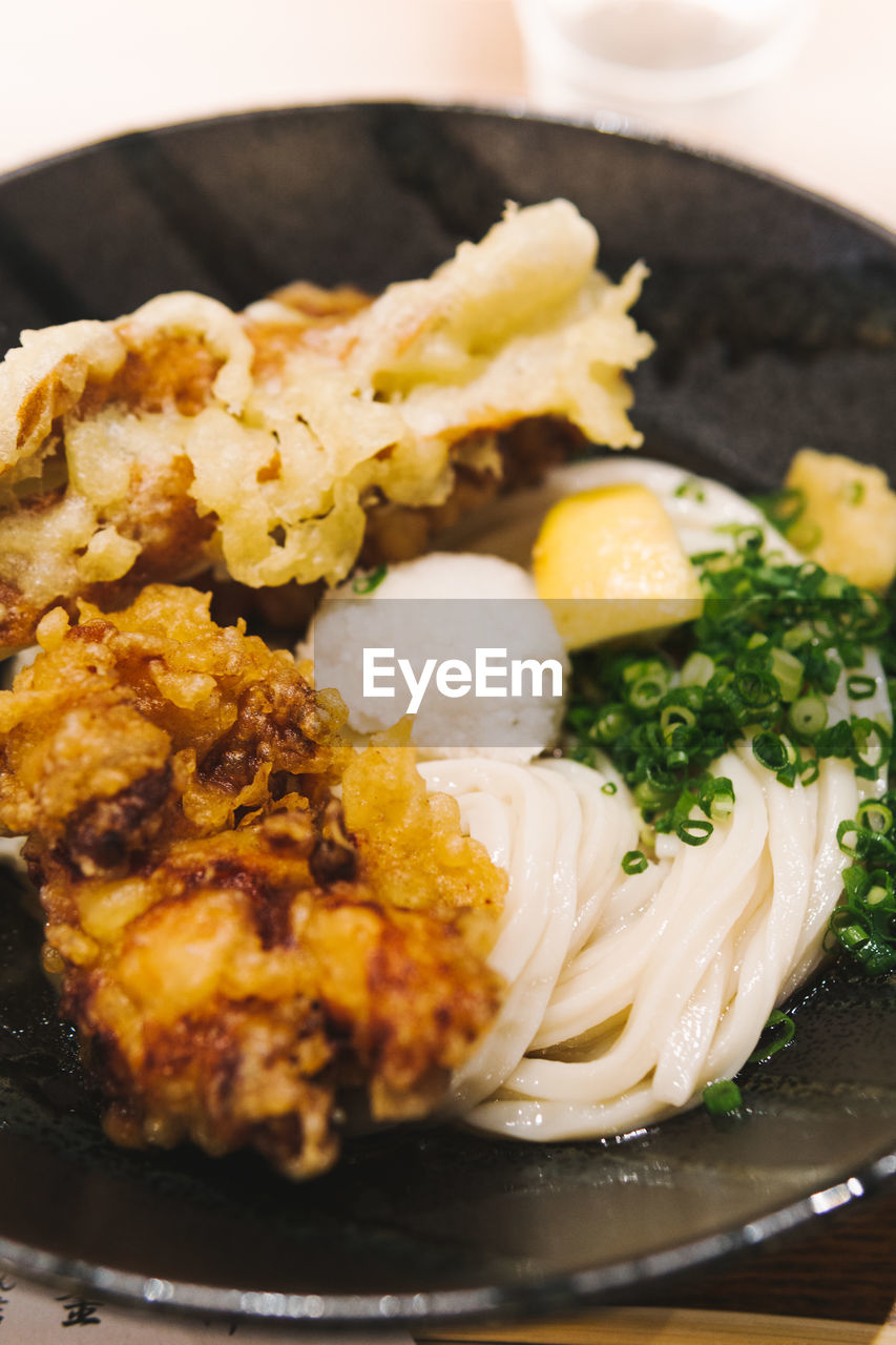 HIGH ANGLE VIEW OF FOOD SERVED ON TABLE
