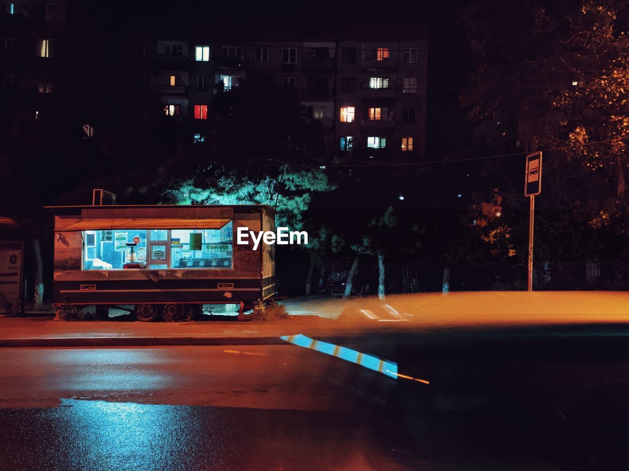 night, darkness, light, city, architecture, street, illuminated, lighting, evening, transportation, road, no people, built structure, building exterior, mode of transportation, communication, sign, car, motor vehicle, screenshot, stage, city life