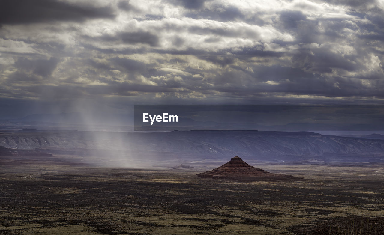 SCENIC VIEW OF CLOUDS OVER LAND