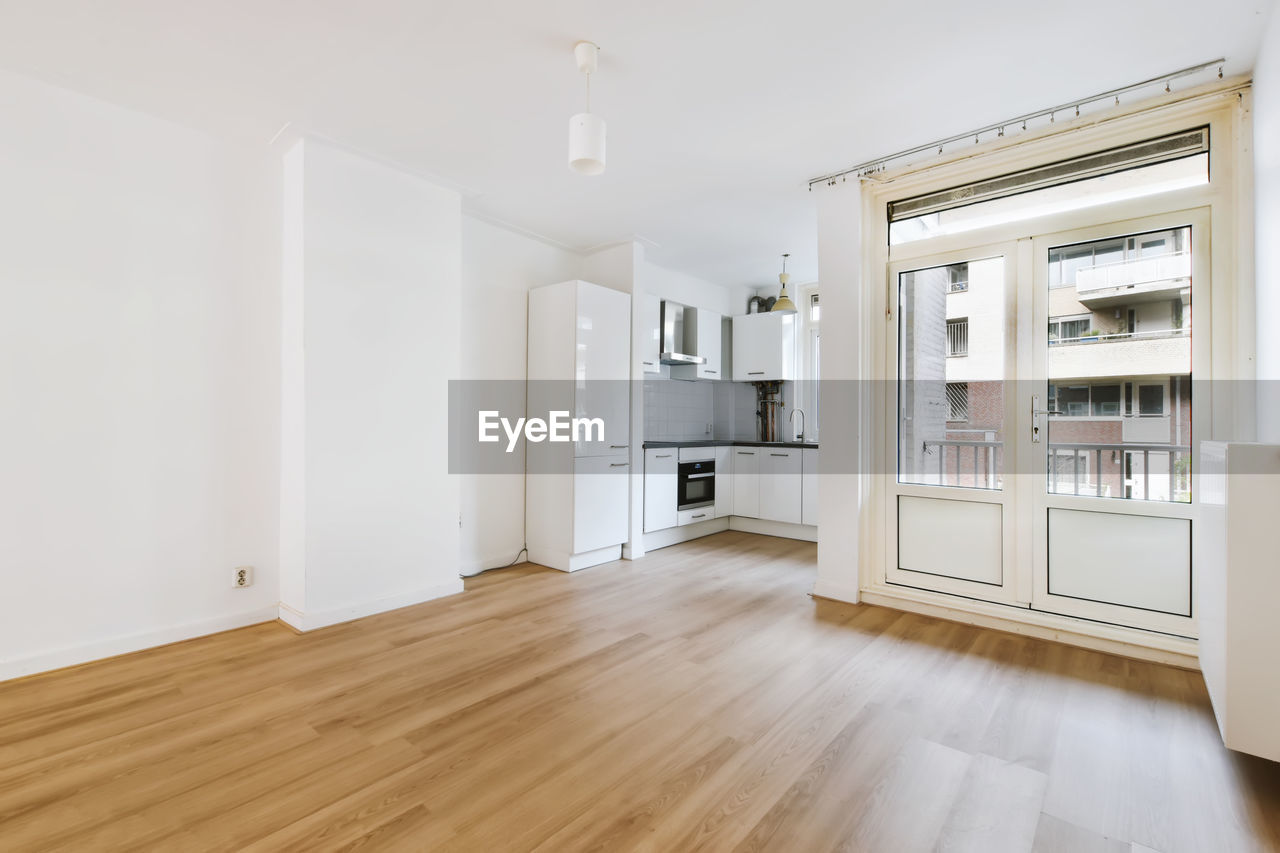 Interior of empty living room with hardwood flooring