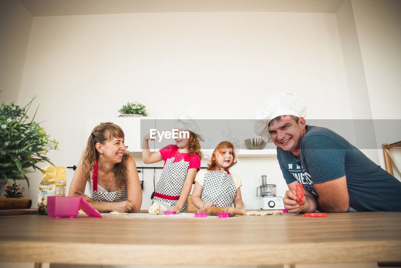 Portrait of happy family at home