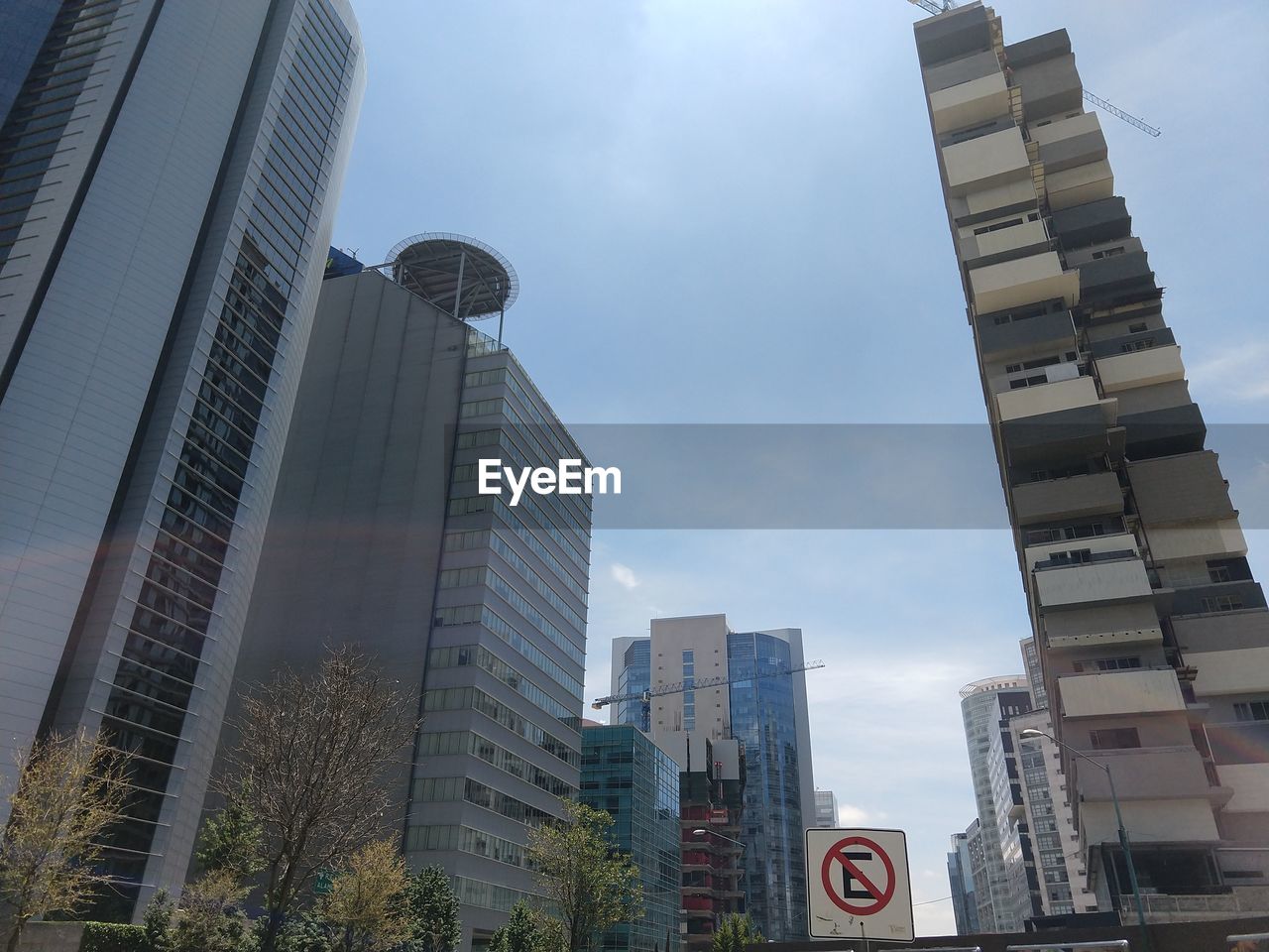 Low angle view of modern buildings against sky