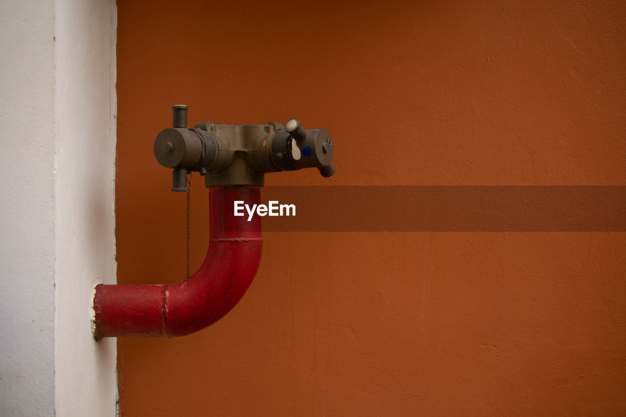 Close-up of pipe on wall