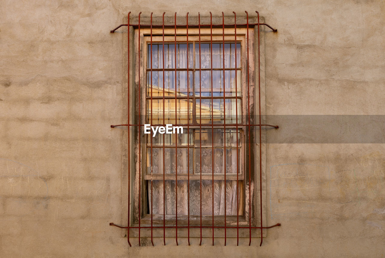 CLOSE-UP OF WINDOW ON BUILDING