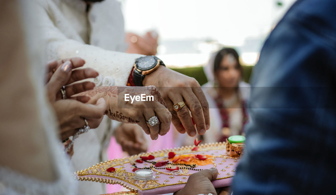 Midsection of man holding food