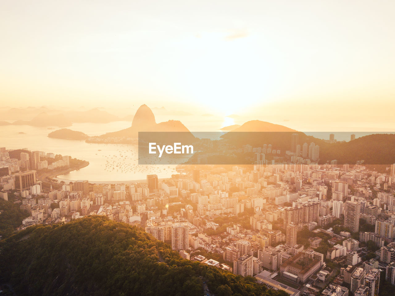 High angle view of city against sky during sunset