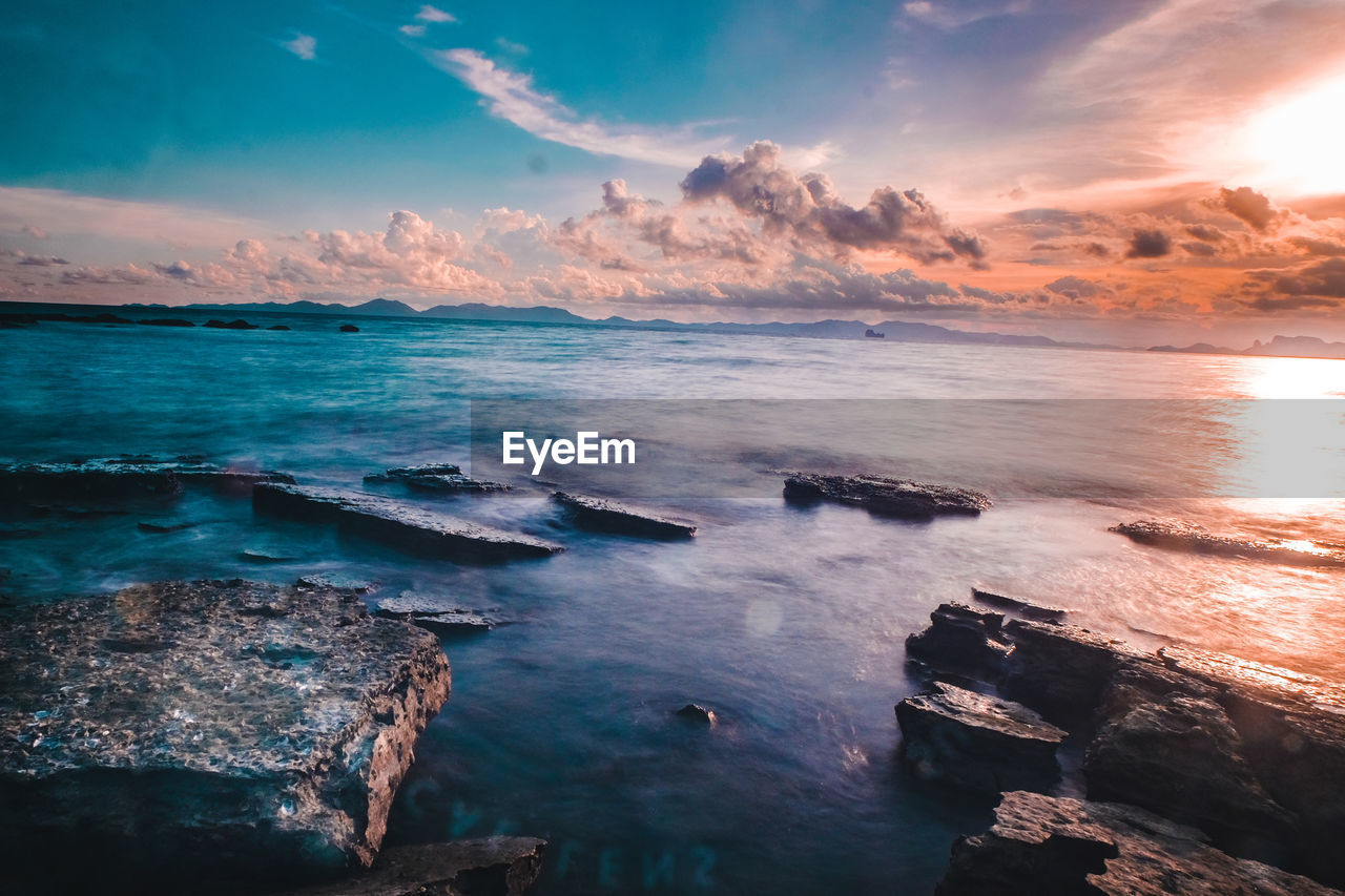 Scenic view of sea against sky during sunset