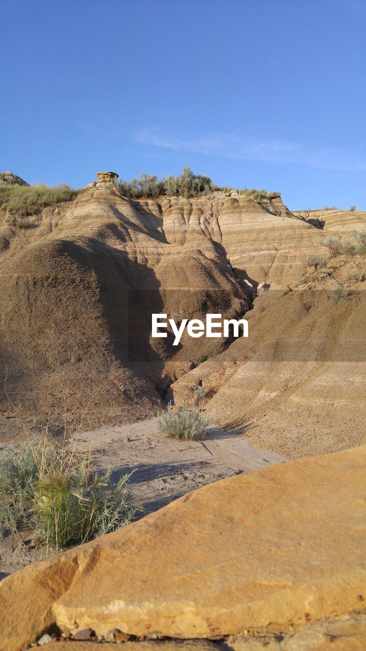 SCENIC VIEW OF DESERT AGAINST SKY