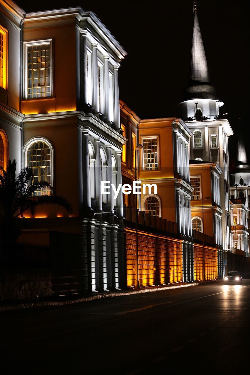 VIEW OF ILLUMINATED STREET LIGHT AT NIGHT