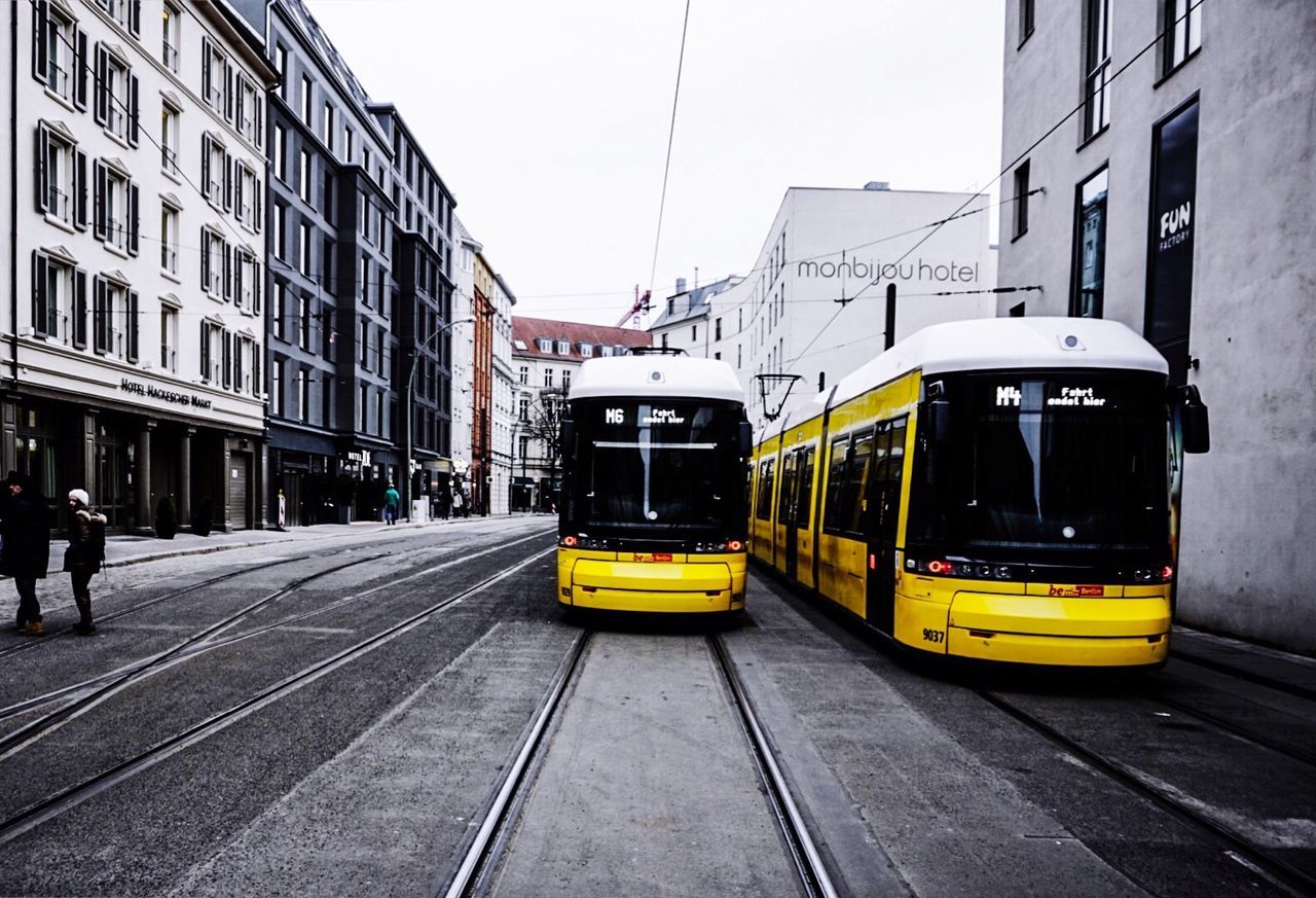 Railroad track passing through city