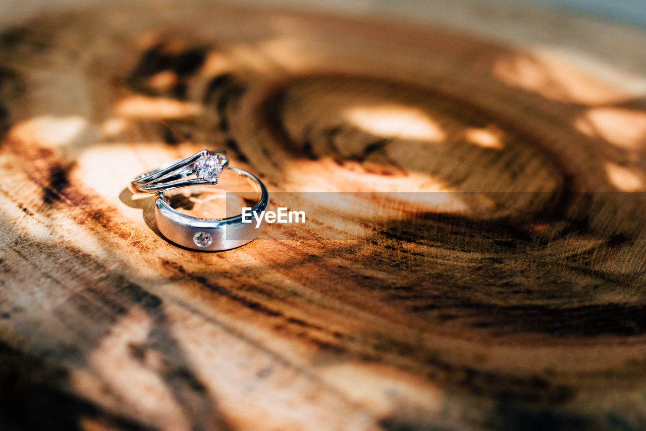 Close-up of finger ring on wooden table