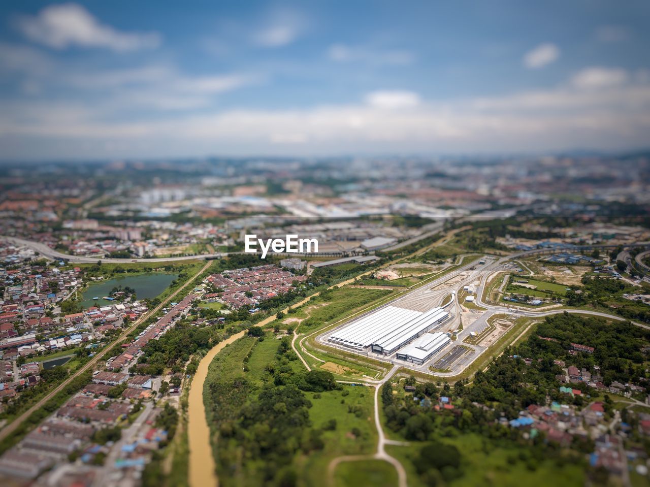 Aerial view of cityscape against sky