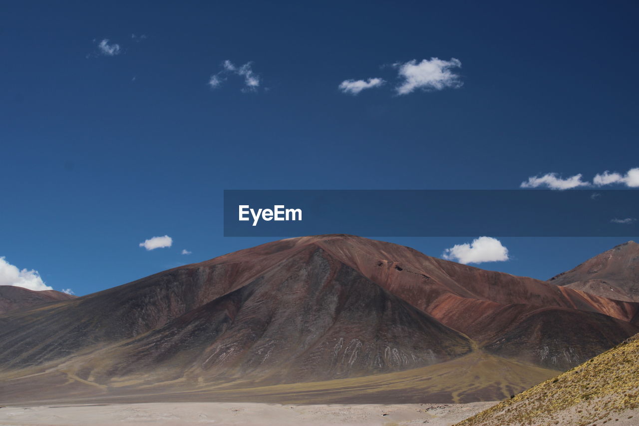 The blue sky and red mountains of piedras rojas, atacama desert, chile