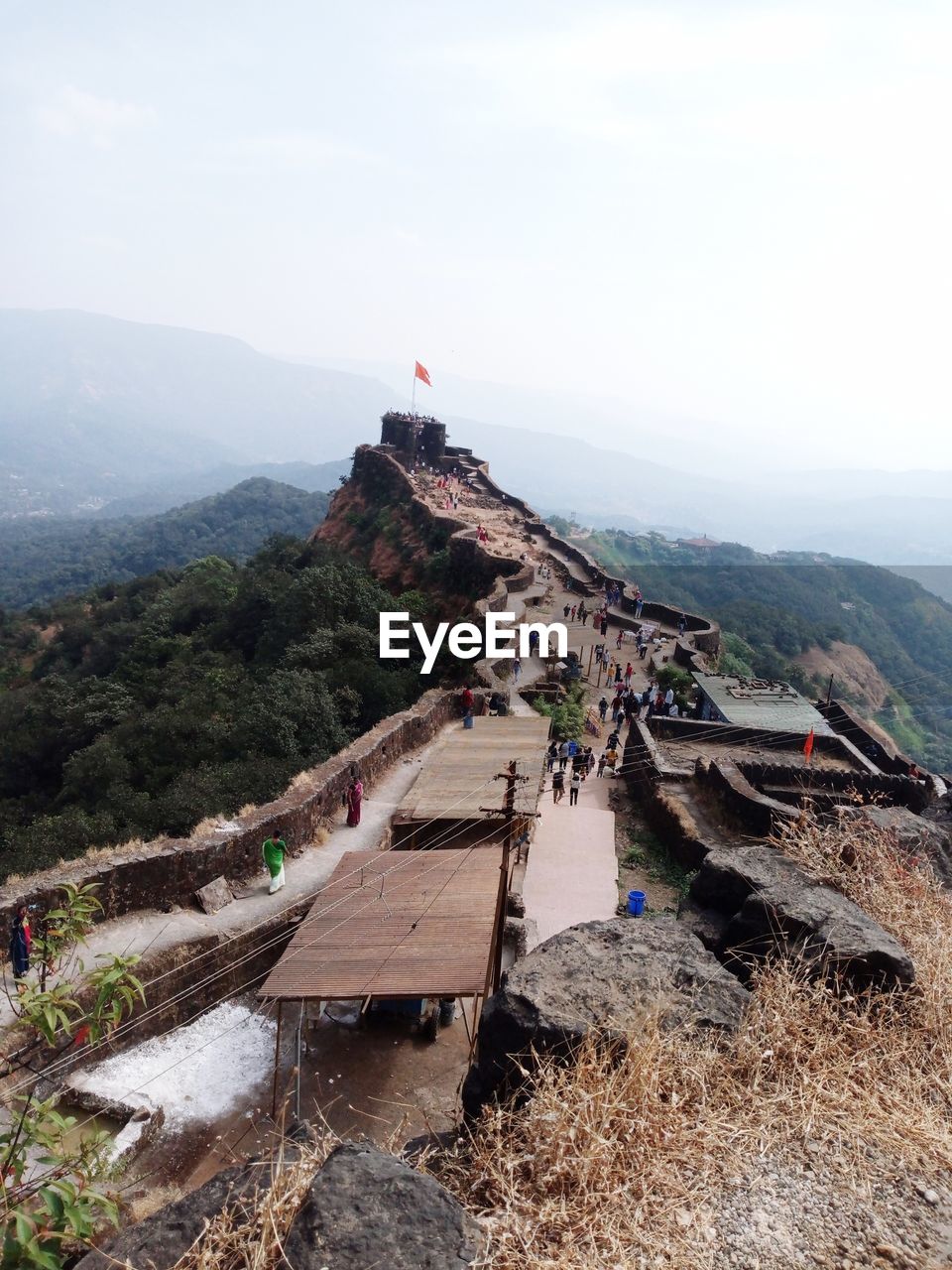 High angle view of buildings on mountain against sky