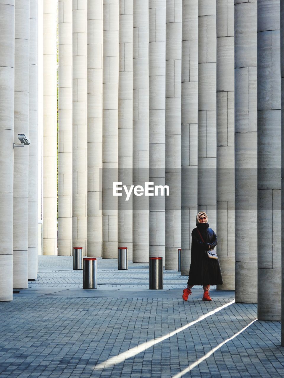 Rear view of woman walking on street