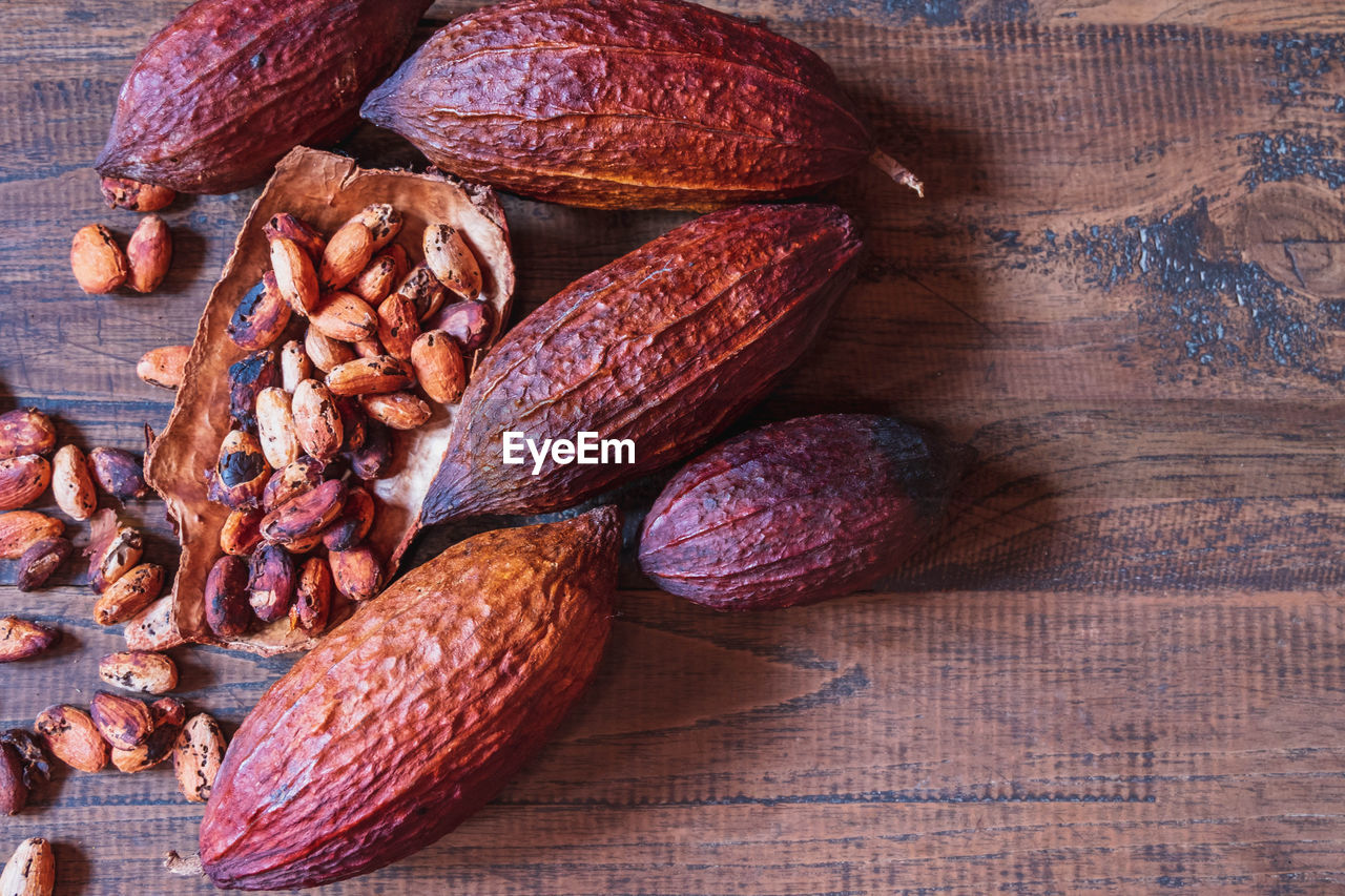 food and drink, food, healthy eating, wellbeing, freshness, produce, nuts & seeds, nut - food, nut, still life, almond, indoors, no people, wood, brown, table, fruit, close-up, plant, high angle view, studio shot, dried fruit, seed