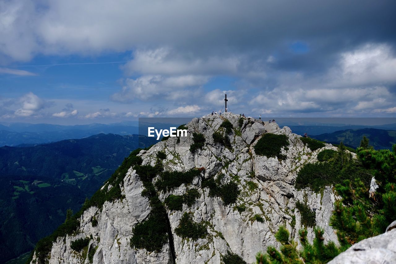 PANORAMIC VIEW OF CROSS AGAINST SKY